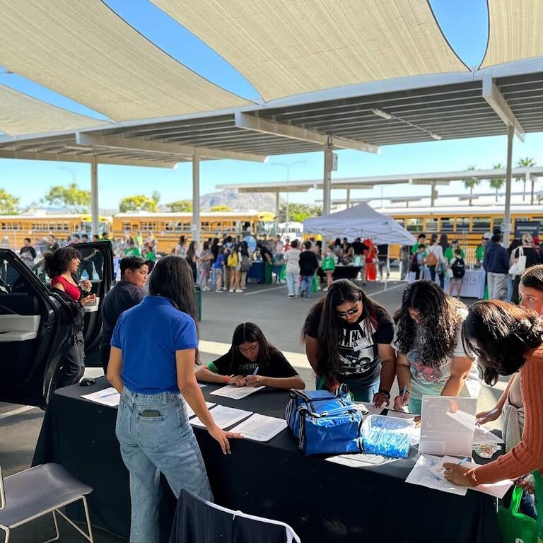 students at ecocars booth for stepcon 2023