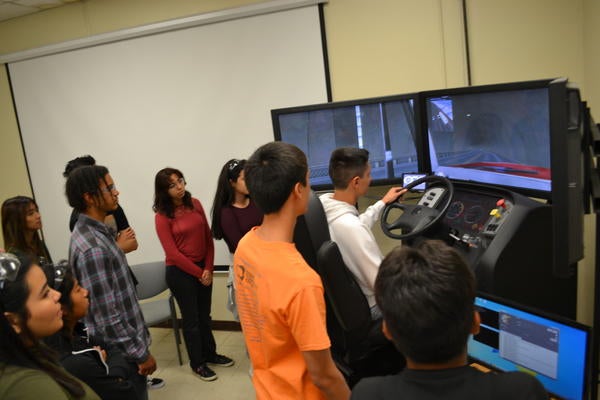 students on simulator