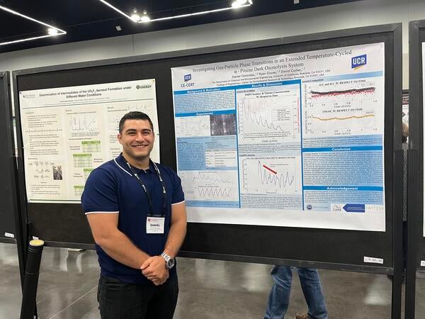 Daniel Gonzales presenting his research at the poster symposium at AAAR