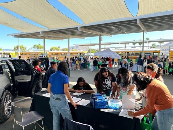 students at ecocars booth for stepcon 2023