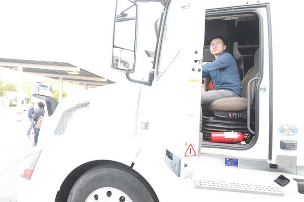 student in truck