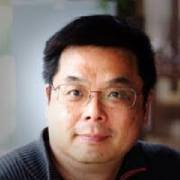 man with glasses smiling
